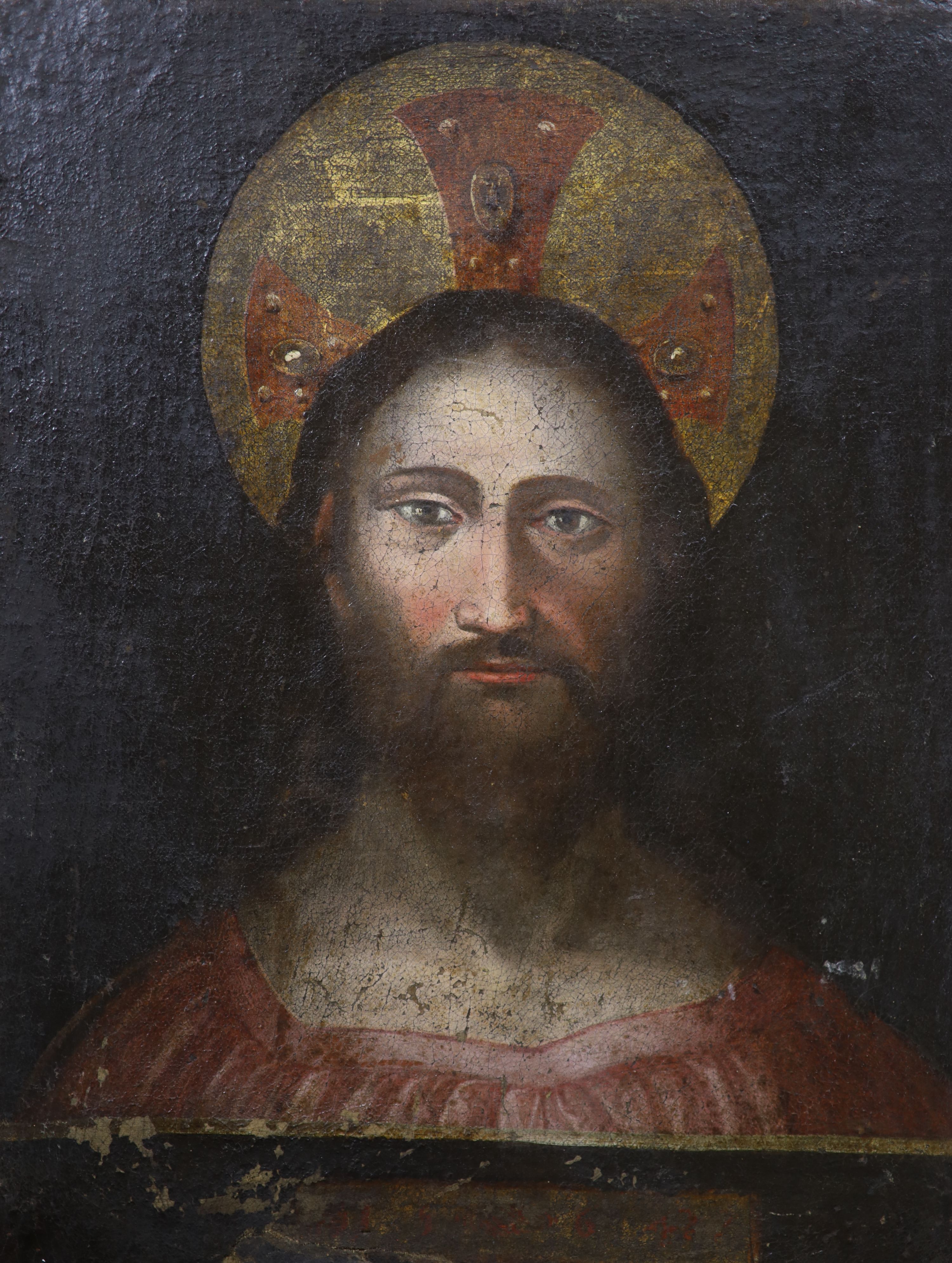 19th Century Continental school, icon of Christ, scripted border to base, oil on canvas, 40 x 33cm.